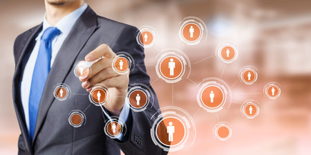 Close up of businessman drawing social net symbols