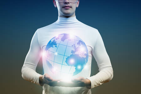 Man holding globe in hands  Futuristic conceptの写真素材