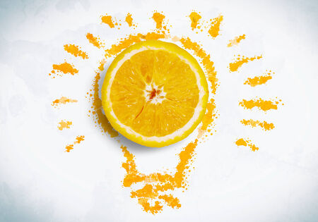Conceptual image with orange against white backgroundの写真素材