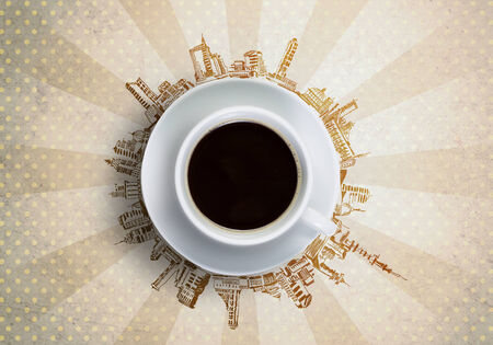 Conceptual image of cup of coffee against sketch backgroundの写真素材