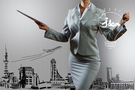 Body of businesswoman drawing business strategy sketchesの写真素材