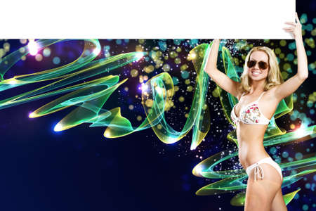 Young pretty woman with blank white banner  Place for textの写真素材