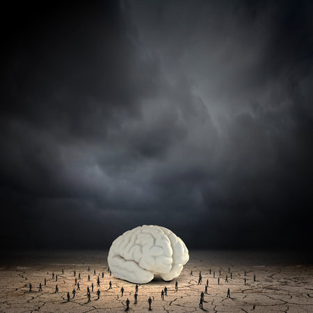 Huge human brain and many little businesspeople aroundの写真素材