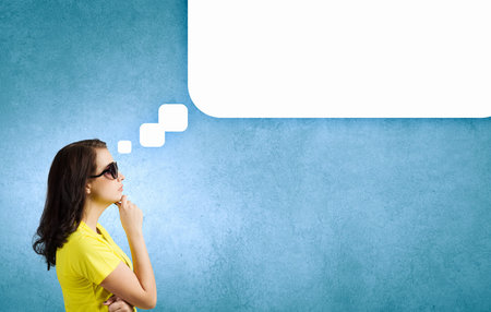 Young woman in casual with blank speech bubble above