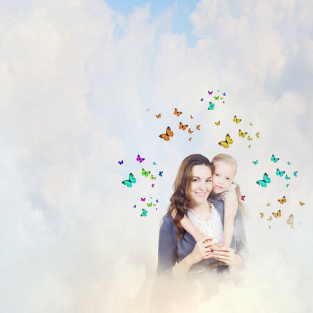 Happy mother and daughter hugging each otherの写真素材