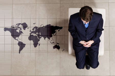 Top view of businessman sitting on chairの写真素材