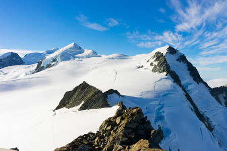 Mountain landscape with snow and clear blue sky