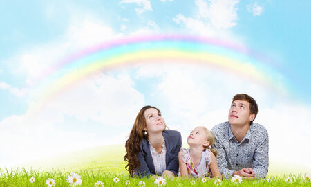 Young happy family of father mother and daughterの写真素材