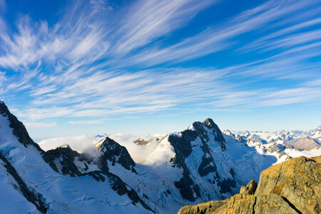 Mountain landscape with snow and clear blue skyの写真素材
