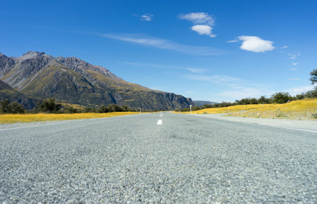 Natural landscape of New Zealand alps and roadの写真素材