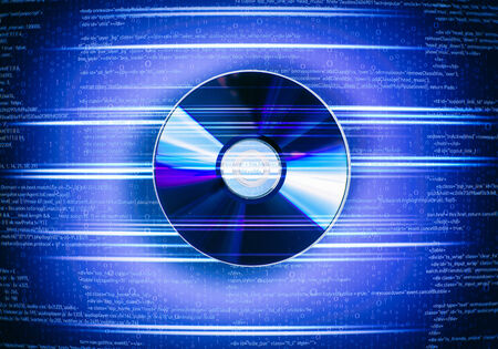 Conceptual image with CD disk and binary codeの写真素材