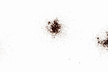 Abstract image with brown powder on white backgroundの写真素材