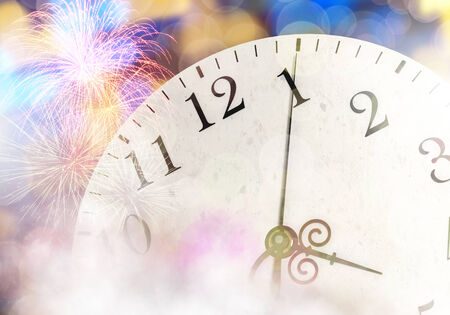 Conceptual image with pocket watch bokeh lights and fireworksの写真素材