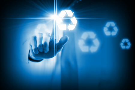 Close up of businessman touching media recycle iconの写真素材