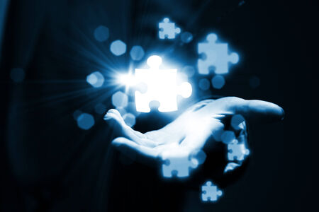 Close up of businessman hand holding iconsの写真素材