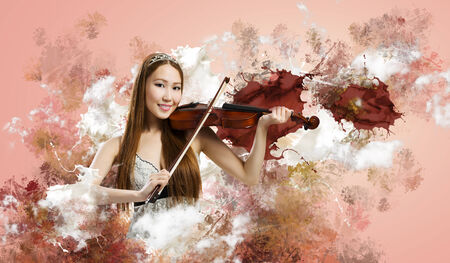 Young pretty asian woman playing violin  Young talentの写真素材