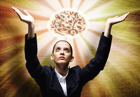 Young praying saint businesswoman with halo above head