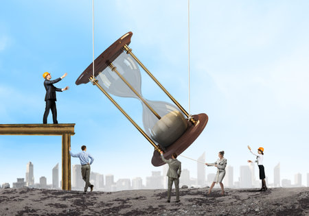 Conceptual image of business people looking at sandglass