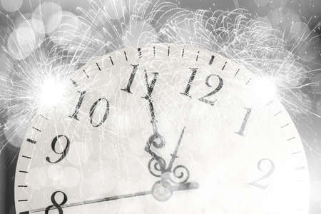 Conceptual image with pocket watch bokeh lights and fireworksの写真素材