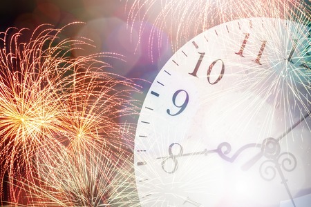 Conceptual image with pocket watch bokeh lights and fireworksの写真素材
