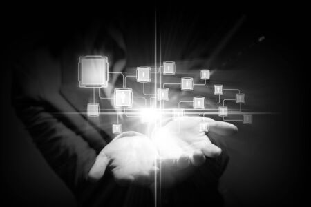 Close up of businessperson holding media icons in palmの写真素材