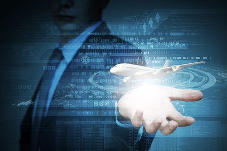 Close up of businessman at digital background with airplane in palm