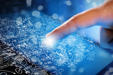 Close up of human hand touching screen of tablet