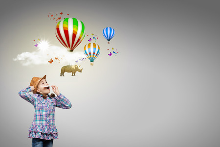 Cute girl wearing shirt hat and mustacheの写真素材