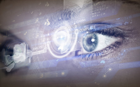 Close up of woman eye in process of scanningの写真素材