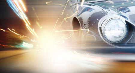 Night blurred city lights of streets and moving carsの写真素材