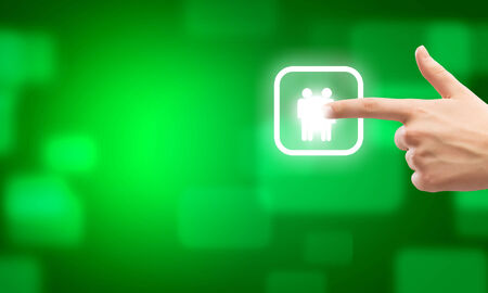 Close u of human hand pushing application iconの写真素材