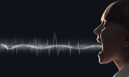 Side view of girl of school age and voice coming out of her mouth