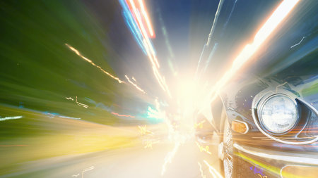 Night blurred city lights of streets and moving cars