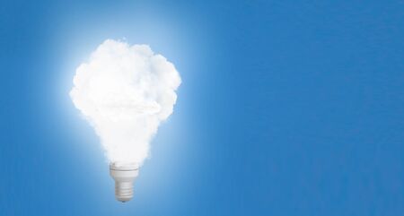 Close up of light bulb and gears mechanismの写真素材