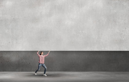 Young girl carrying white blank banner place for text