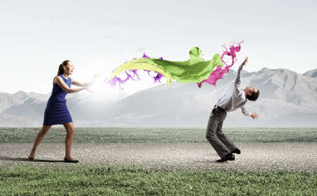 Two business people fighting with each otherの写真素材