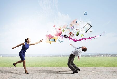 Two business people fighting with each otherの写真素材