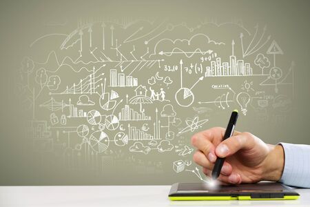 Close up of human hand drawing business strategy planの写真素材