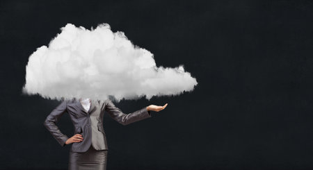 Businesswoman standing with his head in cloud