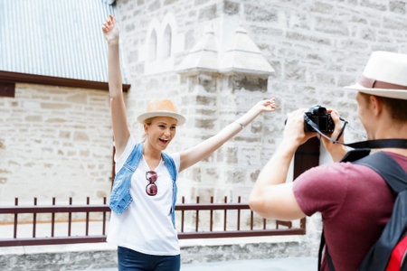 Young woman in city posing for a photoの写真素材