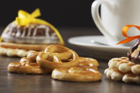 Stack of delicious cookies on napkin tied with ribbonの写真素材