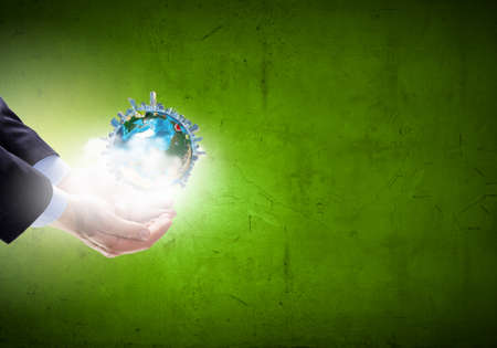 Close up of hand holding Earth planet.の写真素材