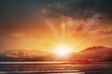 Nature landscape of sunset light above asphalt roadの写真素材