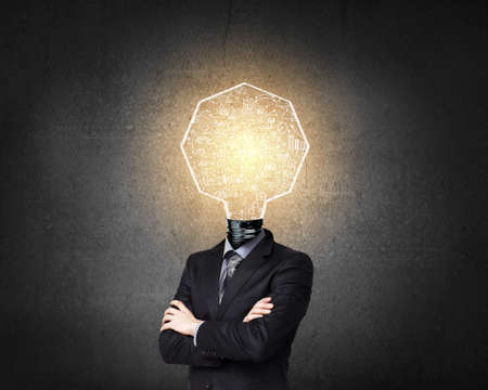 Businessman with light bulb instead of headの写真素材