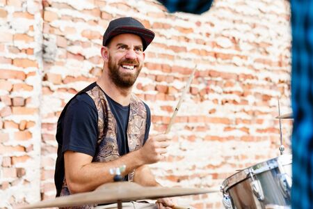 A street muscian playing drumsの写真素材