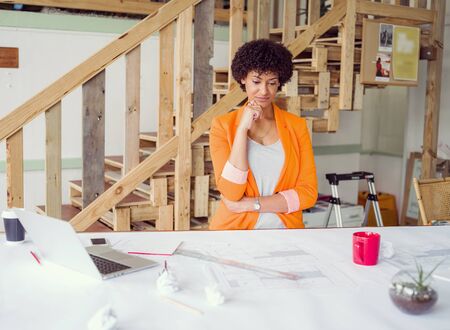 Young female engineer working in officeの写真素材