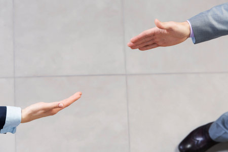Close up of business handshake between two colleaguesの写真素材