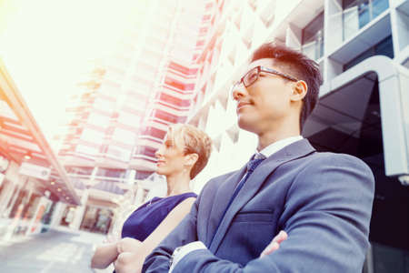 Businessteam members standing next to each other in business districtの写真素材