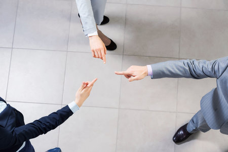 Close up of business peoples hands on top of each otherの写真素材