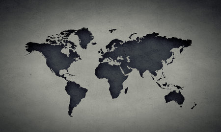 Conceptual image with world map on concrete wallの写真素材
